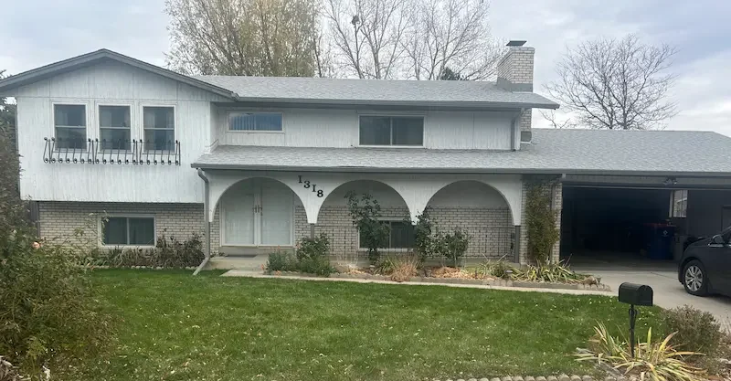 This now renovated Denver home was purchased for cash by New Era Home Buyers.
