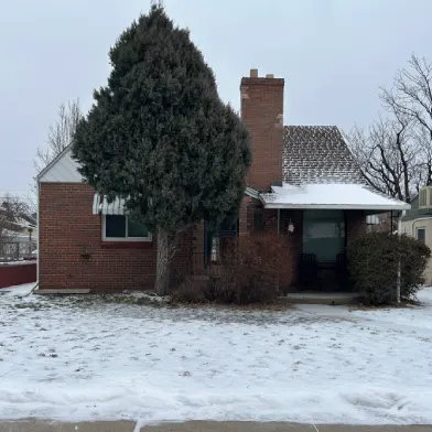 House Covered In Snow